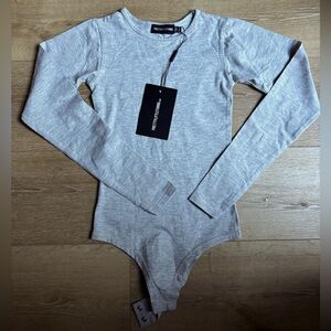 Pretty Little Thing - Size 0 - NWT - Gray bodysuit - Snaps. Adorable!